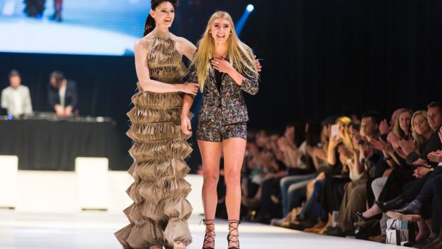 Cooma's Charly Thorn (on the right) with one of her models and creations at Canberra FashFest 2016. Souce: Canberra Times, taken by Martin Ollman.