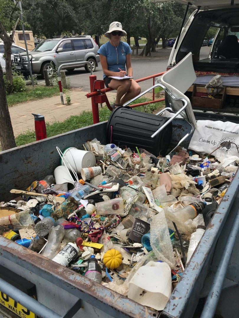 A Clean Up Australia volunteer keeps tabs on rubbish collected from Lake Burley Griffin recently.