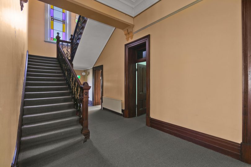 What every grand home needs, a grand central staircase. Photo: Supplied