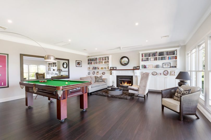 An enormous games room with home cinema