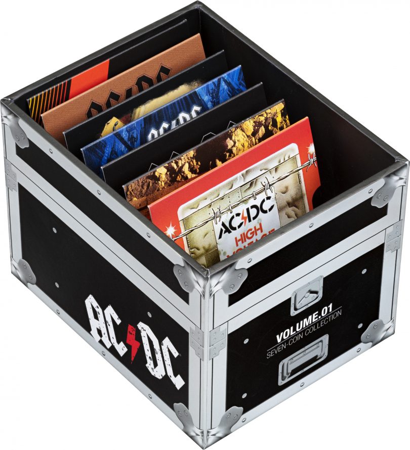 Packaging for seven-coin collection of AC/DC coins. 