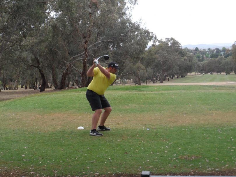 Dominic Falk playing golf