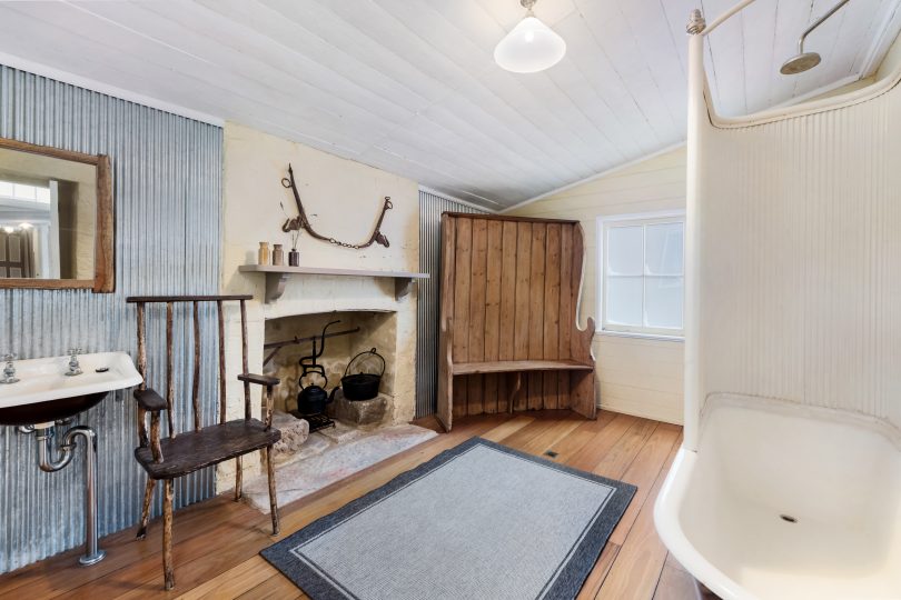 Bathroom with open fireplace