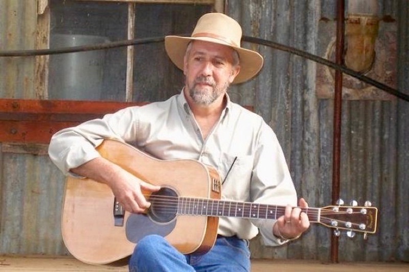 Ron McLaughlin playing guitar.