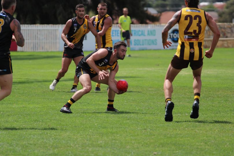 Queanbeyan Tigers players in game against Wangaratta