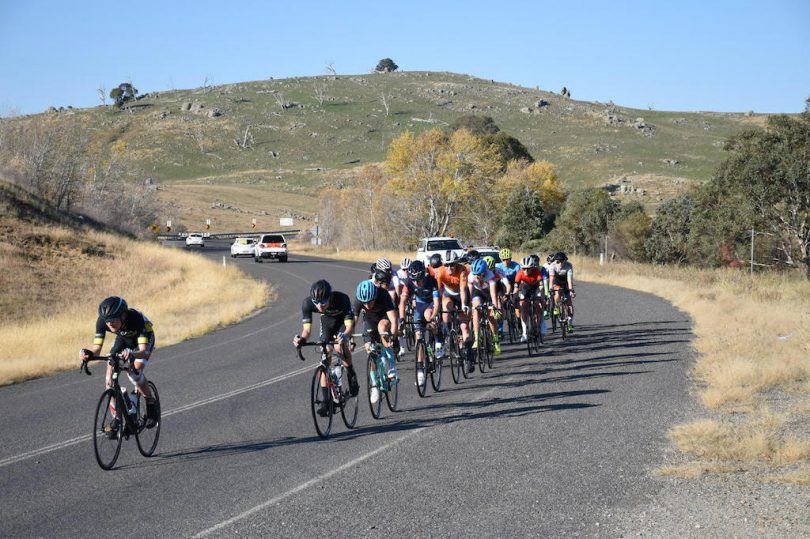 Cyclists riding up a hill on the Old Hume Highway between Gunning and Breadalbane