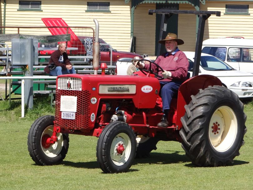 Barry Hickson driving red tractor