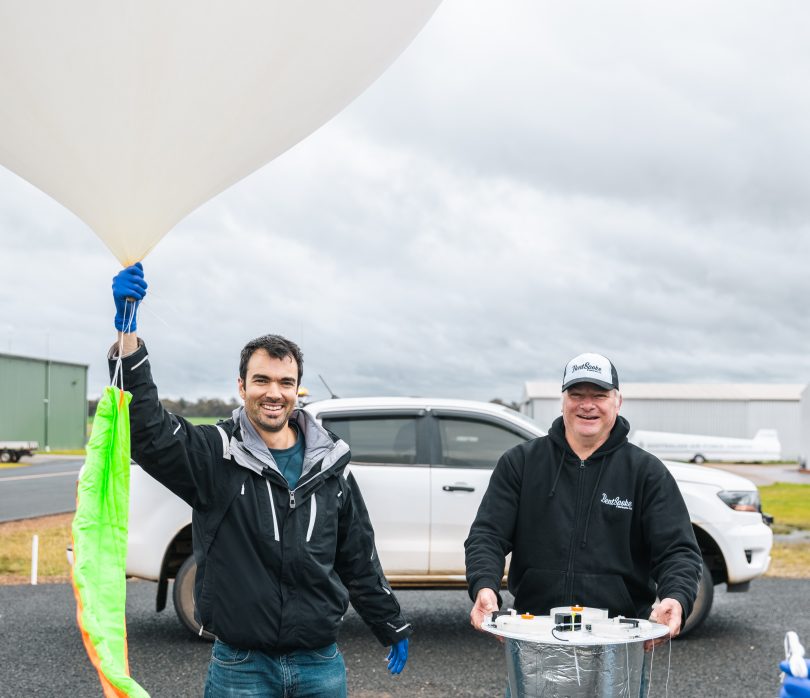 Dr James Gilbert and Richard Watkins launching high-altitude balloon