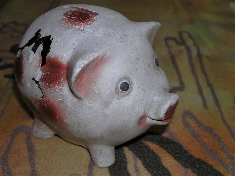 White and pink ceramic piggy bank