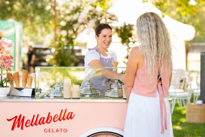 Melany Batley serving gelato at Mellabella Gelato mobile cart