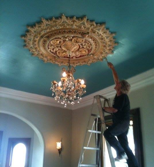 Steve Hazelton painting ceiling rose in mansion at 'Teneriffe'