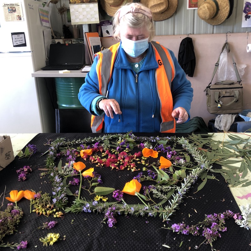 Jennifer arranging flowers at Growing Abilities