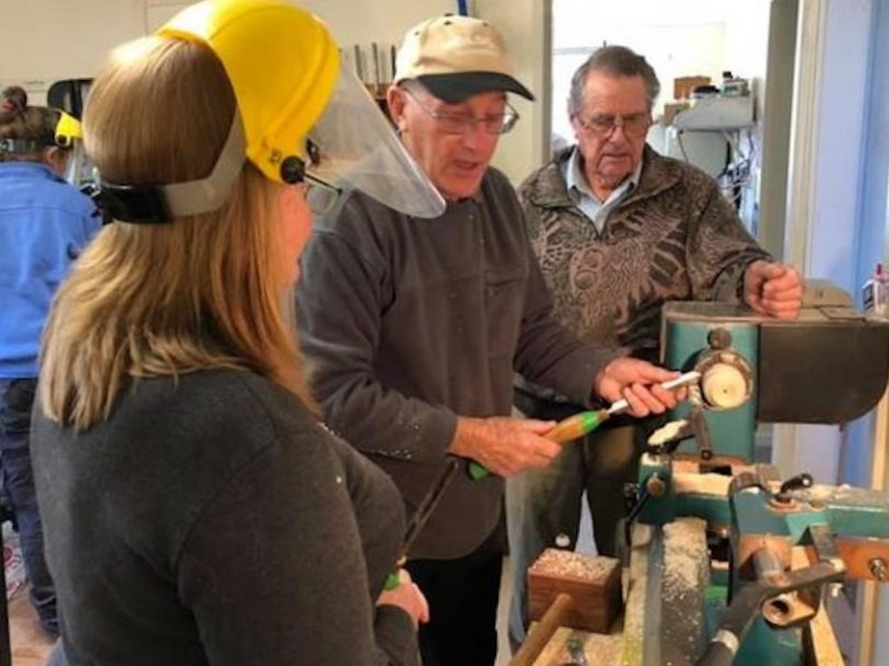 Jack Treweek, Ken Buck and female visitor to Goulburn Region Woodworkers club
