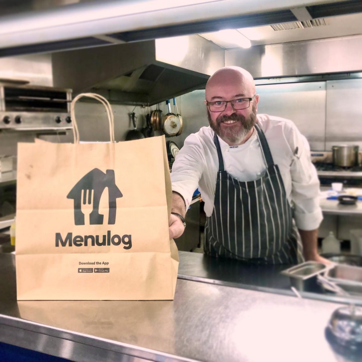 Chef with Menulog bag
