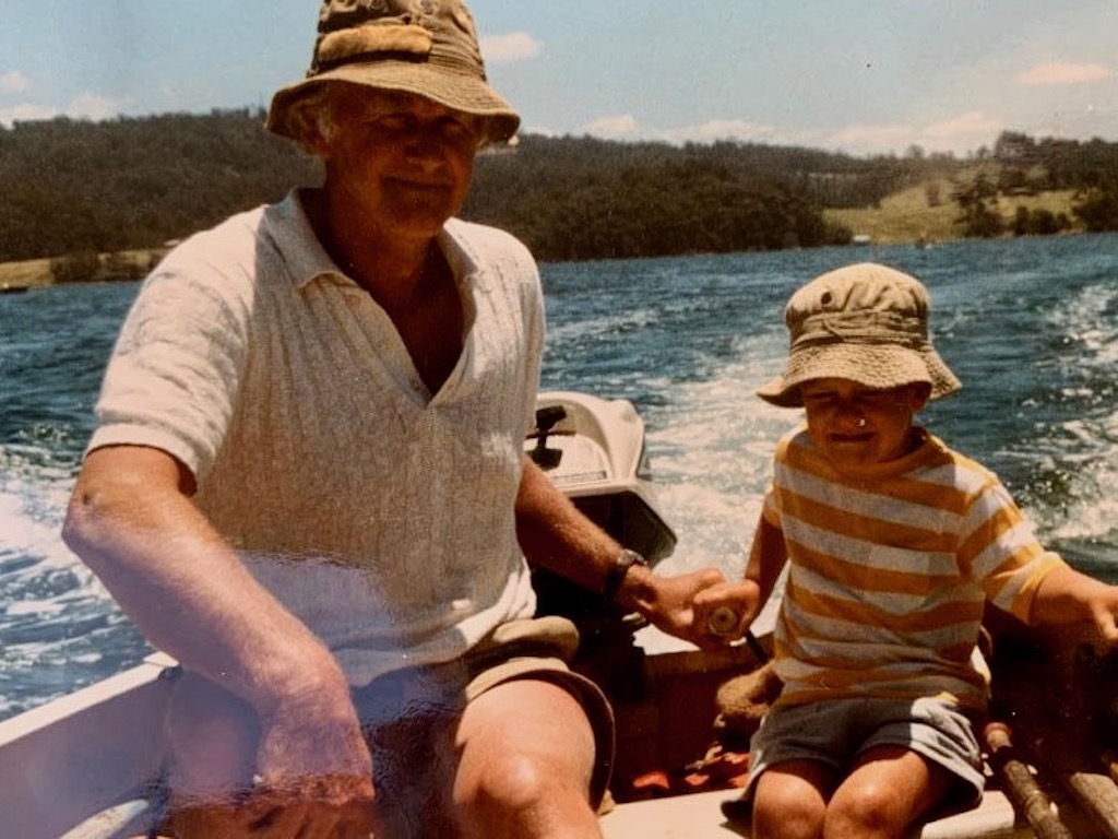 Jeff and son Charlie in a boat off Narooma.