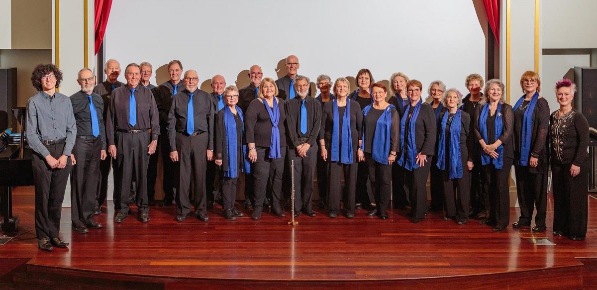Vocal group Rhythm Syndicate gathers on stage