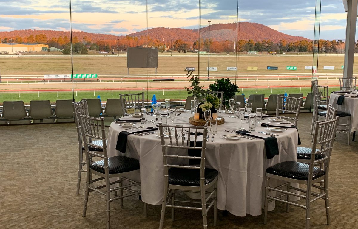 table setting with a view overlooking Thoroughbred Park