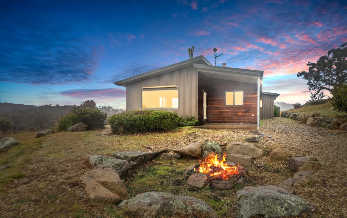 fire pit next to a house