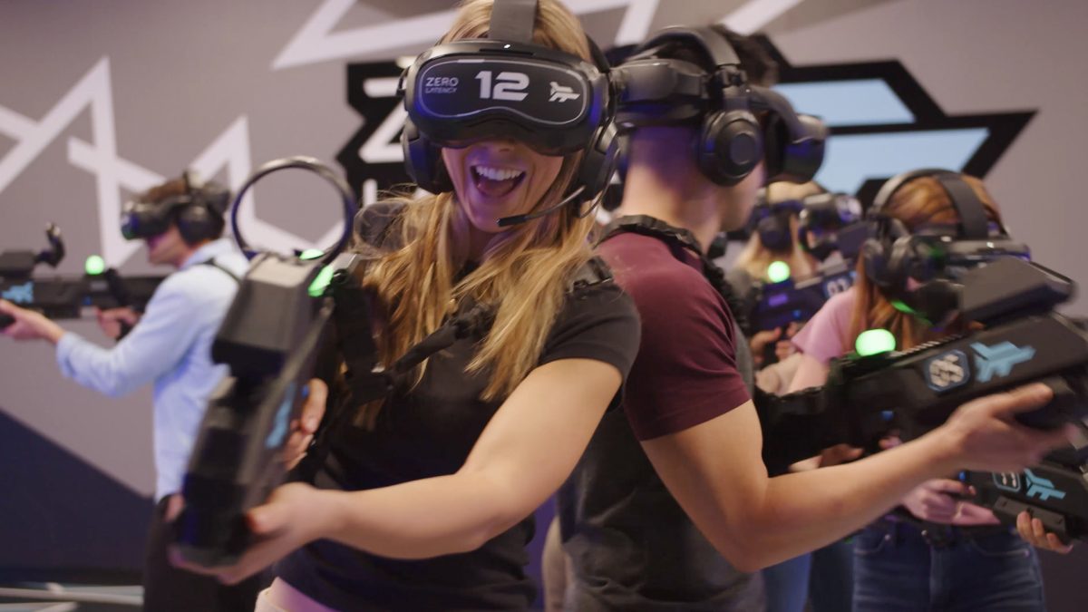 People posing in virtual reality apparel