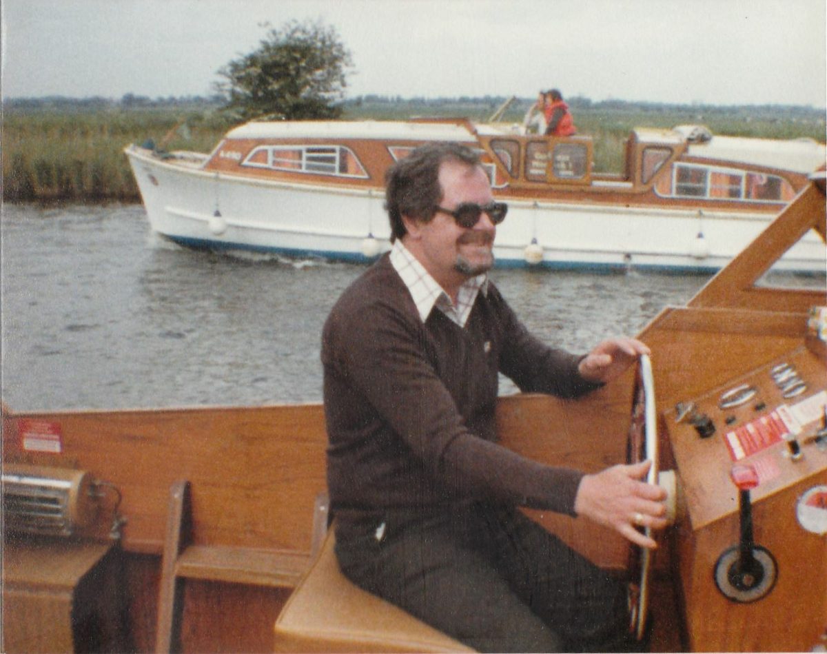 old photo of a man in a boat