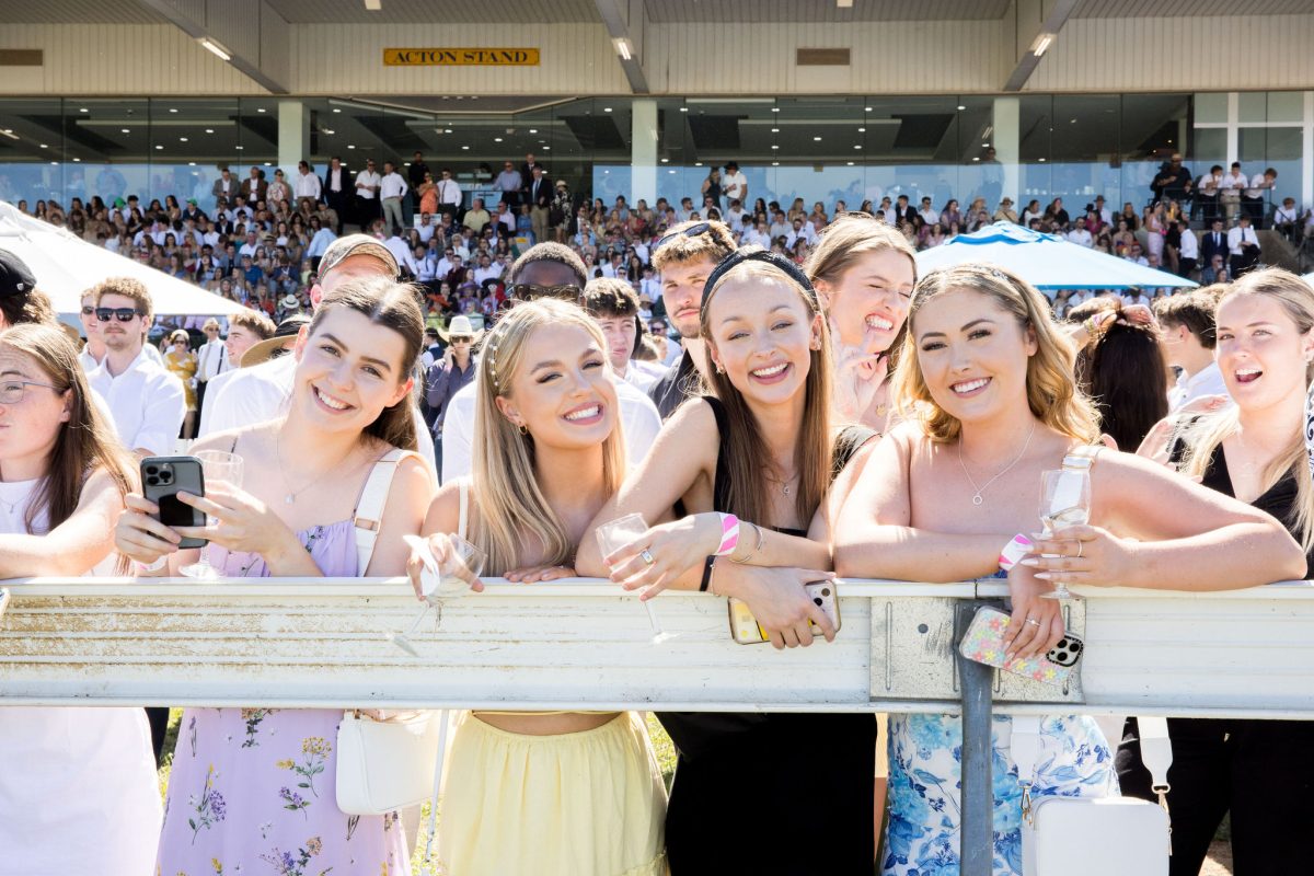 people standing trackside at Thoroughbred Park