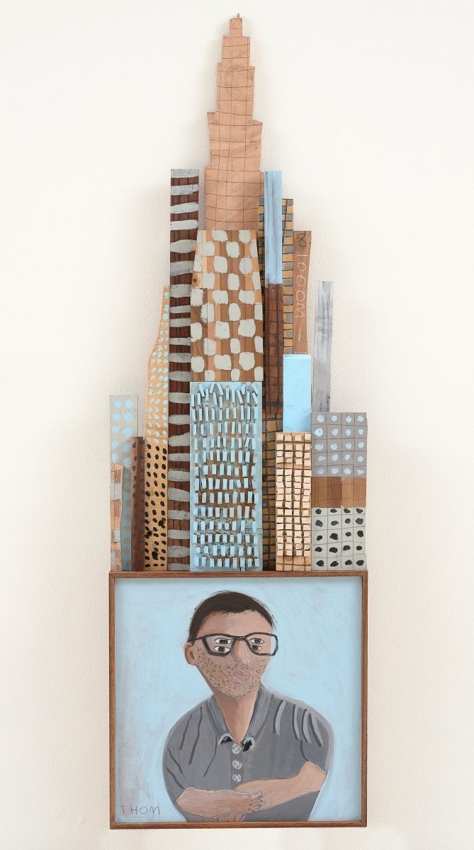 Portrait of a man in front of architecture