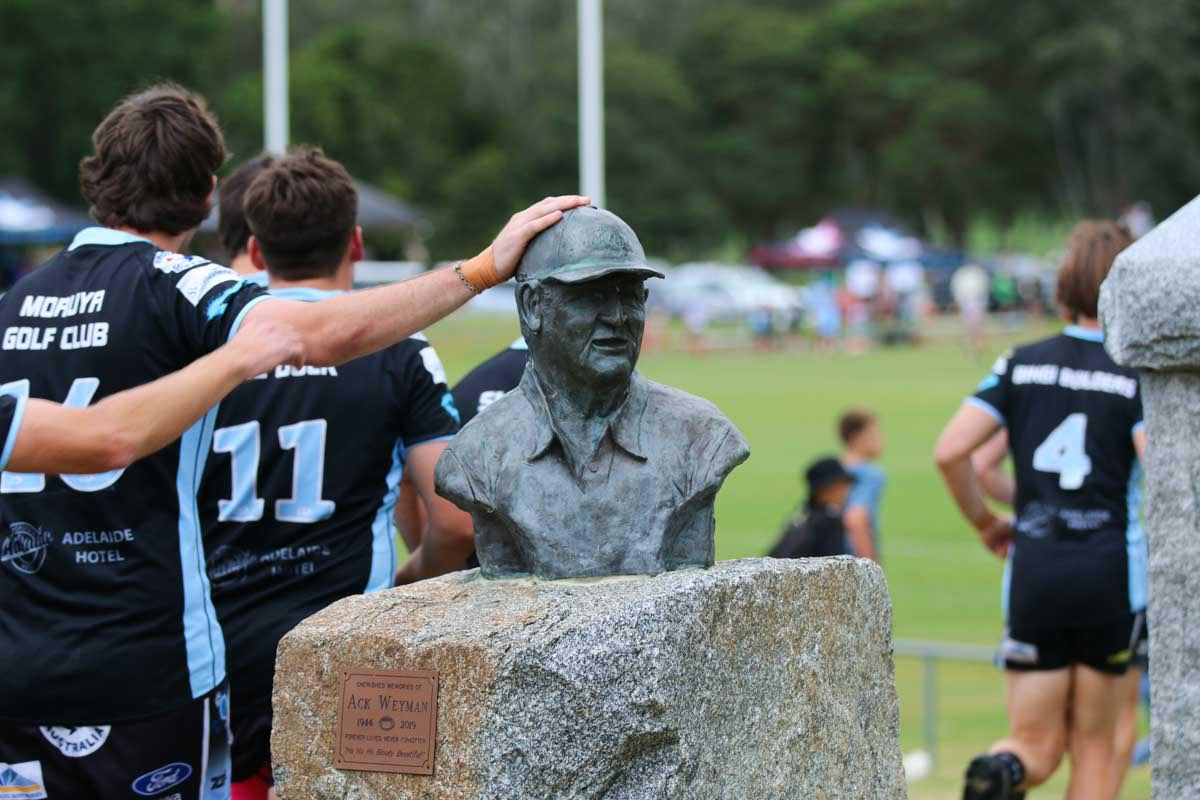 A Moruya Sharks player taps the head of Ack Weyman before playing. Photo: Katt Patton Photography, Moruya Sharks RLFC Facebook.