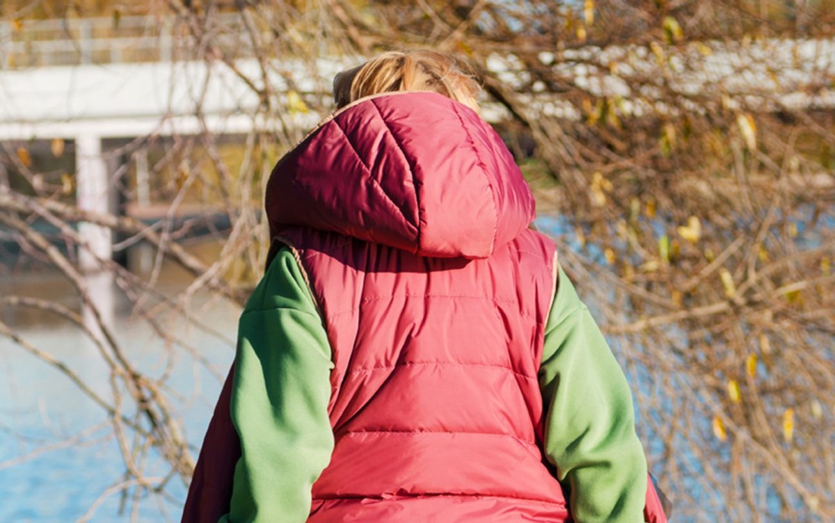 back of a person in a puffer jacket