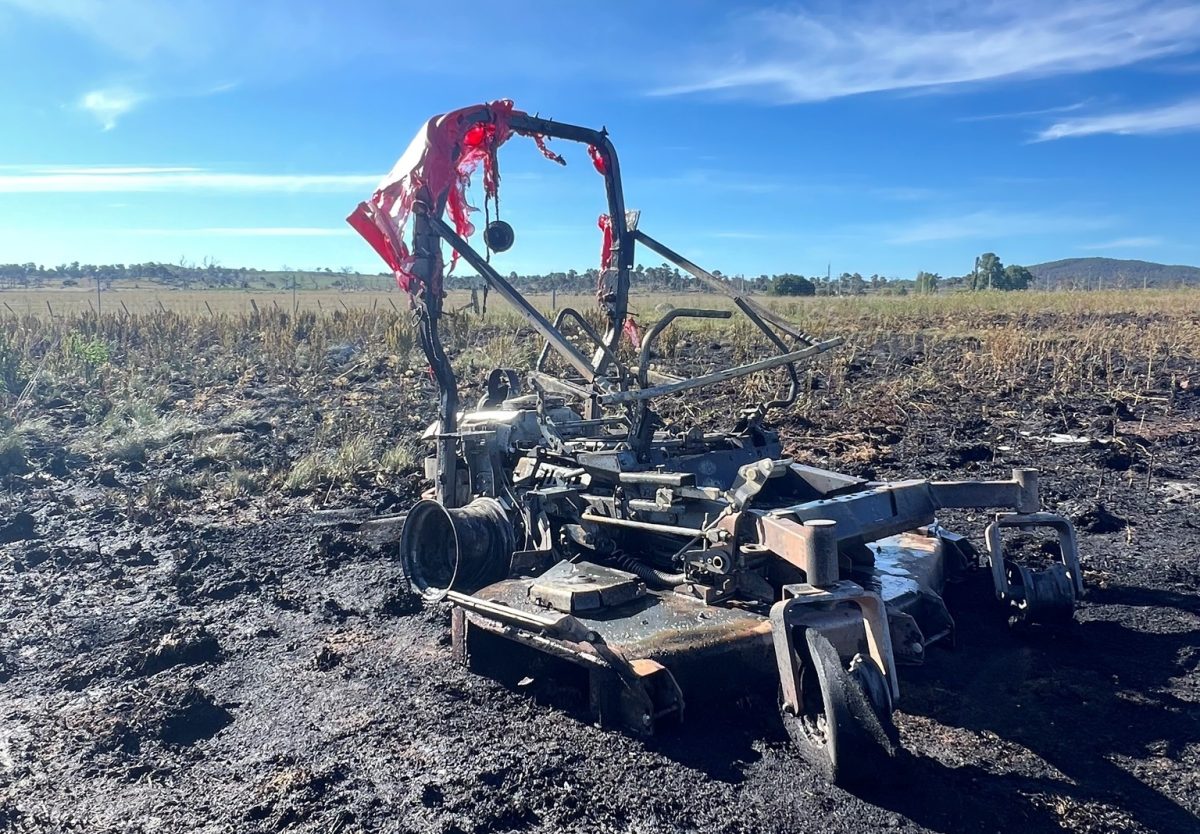 A burned out lawn mower from a grass fire south of Canberra