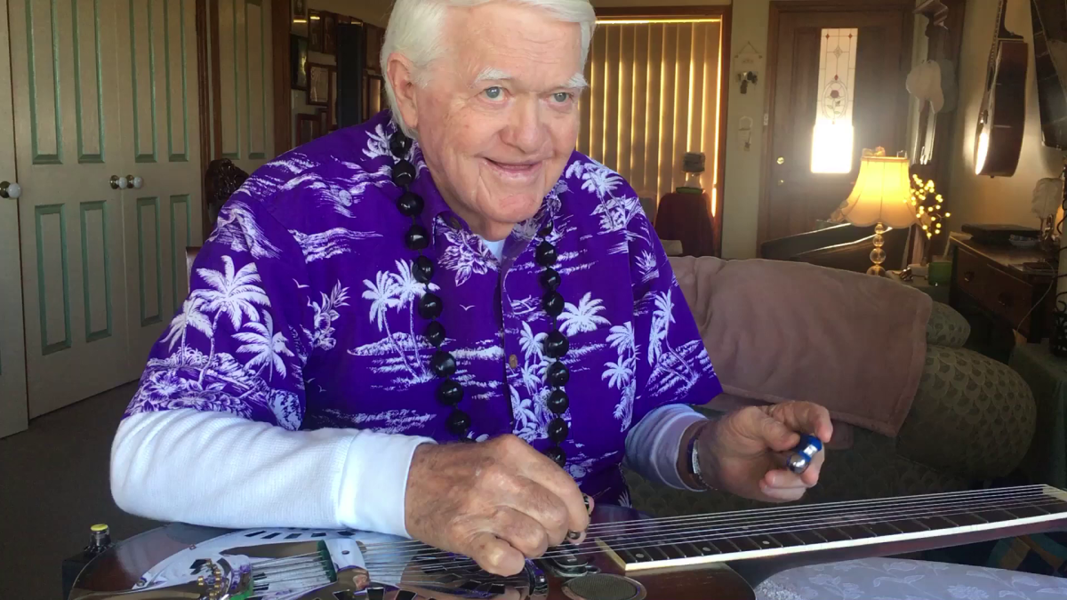 Man in purple shirt