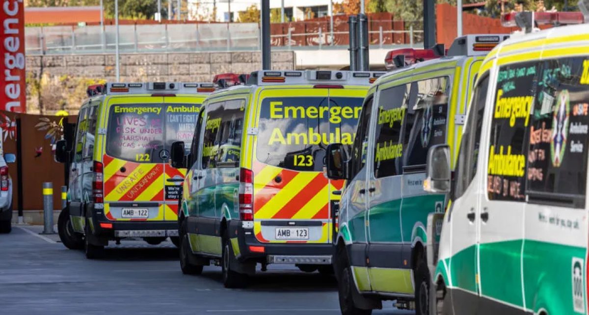 Multiple ambulance vehicles queuing up for the emergency department.