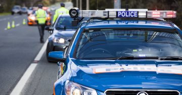 Two-car crash causes 4WD to flip onto roof at Batemans Bay