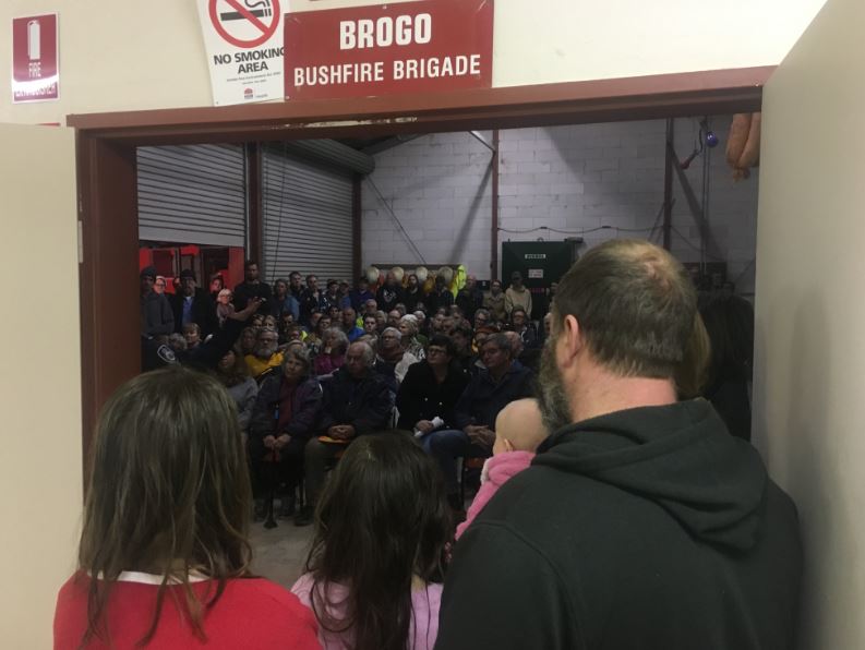 Around 150 people packed into the Brogo RFS shed for a community meeting about the Yankees Gap Fire. Photo: Ian Campbell.
