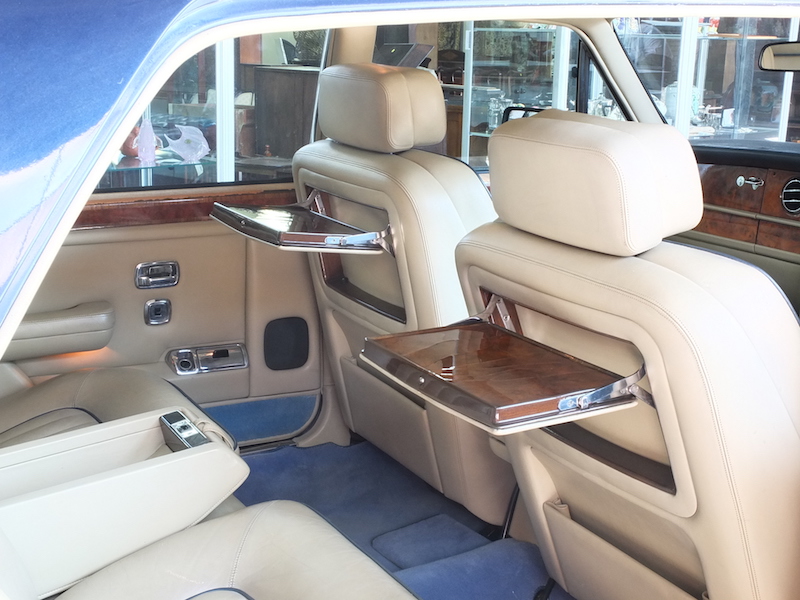 picnic tables unfold inside the gracious Silver Spur Rolls Royce, which has numerous other pleasing features.