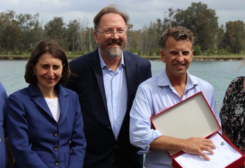 NSW Premier Gladys Berejiklian, Dr Michael Holland, and Member for Bega, Andrew Constance holding the One Eurobodalla petition. Photo: Ian Campbell