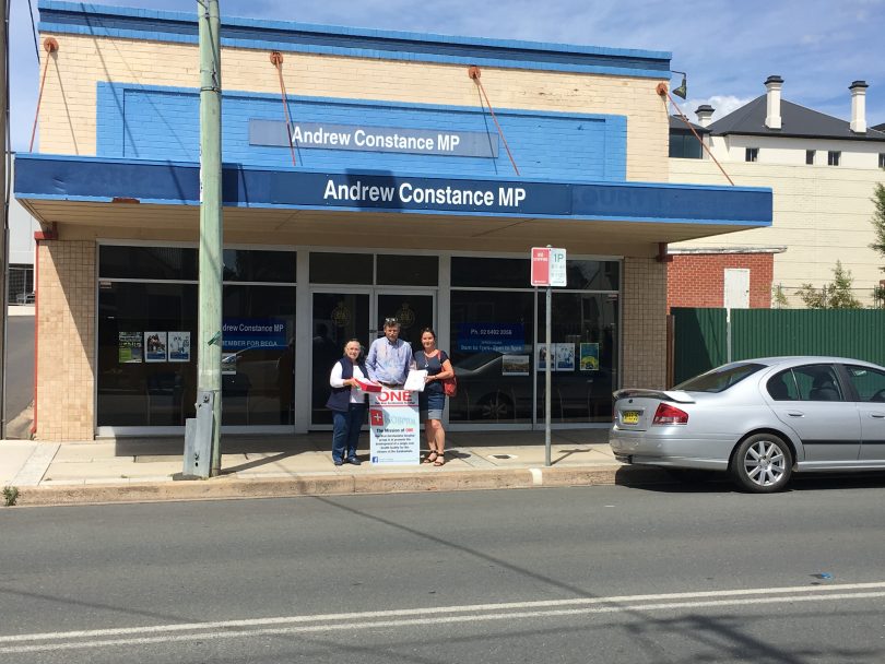 Mylene and Fitzroy Boulting and Georgie Rowley from the One Eurobodalla Hospital group made the trip to the Bega office of Andrew Constance to deliver their 3000 signature petition. Photo: Ian Campbell.