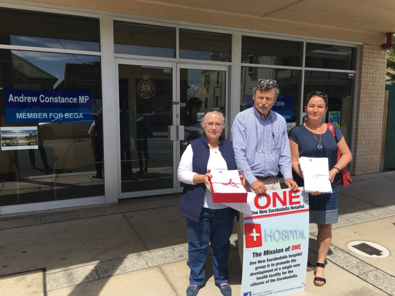 Mylene and Fitzroy Boulting and Georgie Rowley delivering the One Eurobodalla Hospital petition to he Bega office of Andrew Constance. Photo: Ian Campbell.