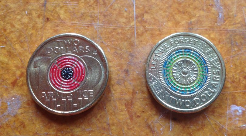 Tony Dean has his initials on two circulating two dollar coins in a series of Remembrance Day coins. Photo: Elka Wood.