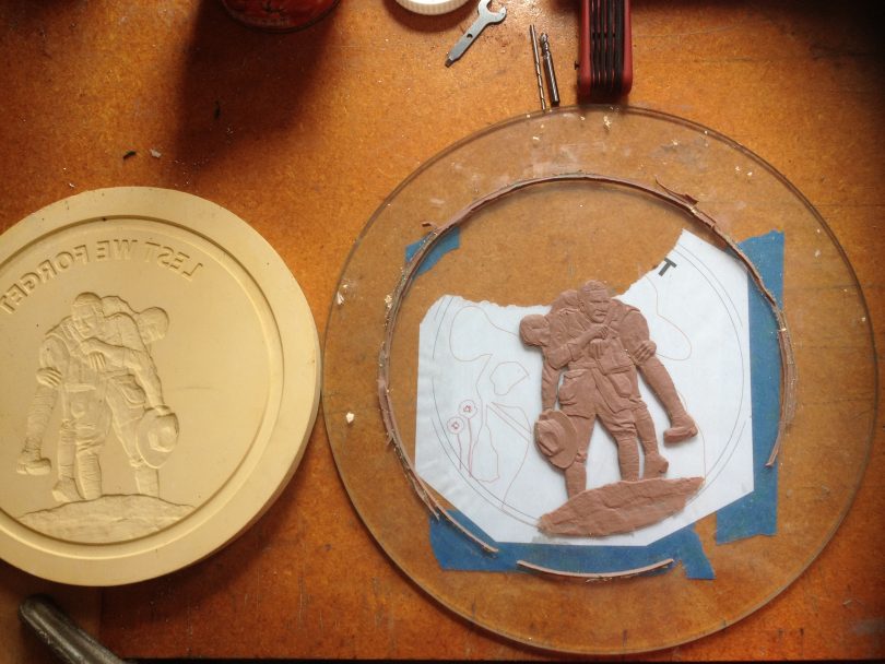 An example of plasticine bas-relief sculpture by Tony and the sculpture's negative plate. Photo: Elka Wood.