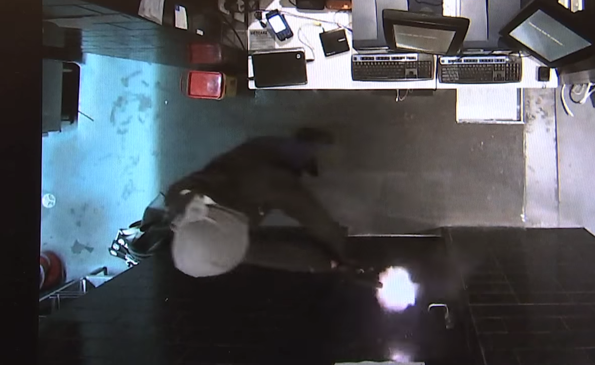 Police release CCTV footage of gun-wielding man robbing Hotel Queanbeyan