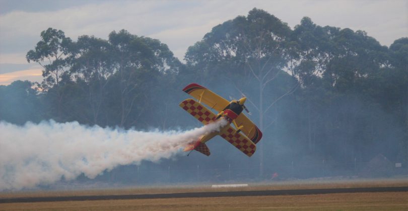 Paul Bennett displaying his skill with a wing tip just feet above the tarmac along the runway. Photo: Alex Rea.
