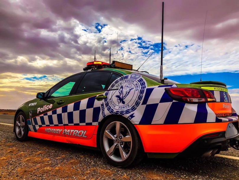NSW Police Highway Patrol vehicle parked roadside