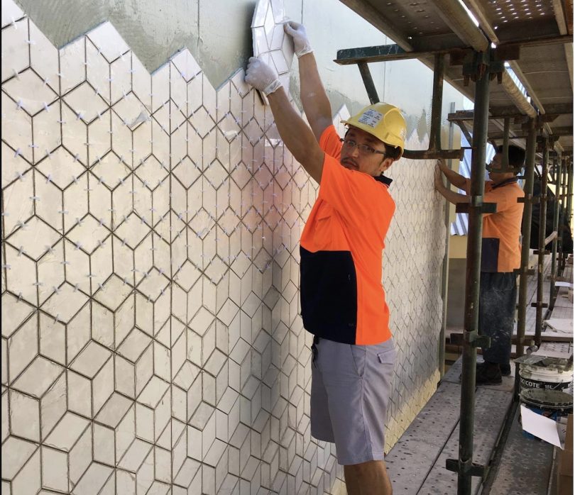 Social Enterprise Nick Tiling empowers refugees with training and employment. Photo: Facebook