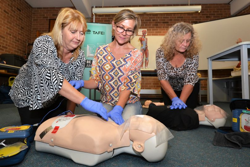 First Aid teacher Georgie McInerney offers life-saving skills to student Sandra Davis. Photo: Supplied.