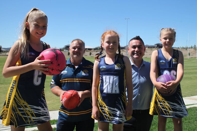 Active kids from the Googong Hogs Netball and AFL Club with Member for Monaro, John Barilaro. Photo: Supplied.
