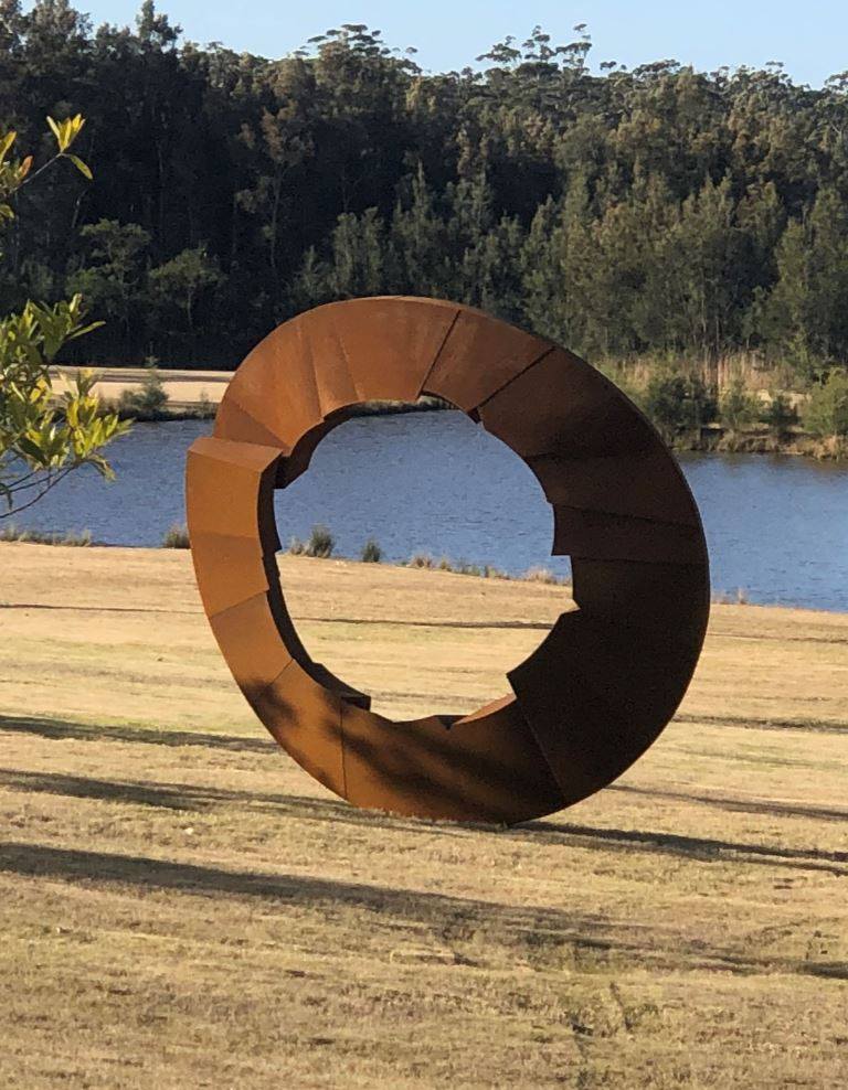 A sculpture by David Ball that is in a donut-shape