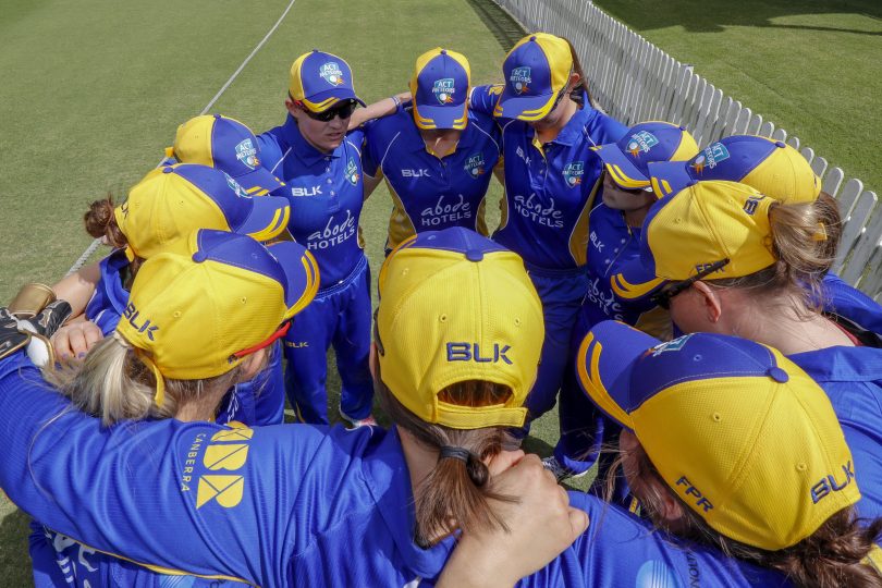 ACT players huddle before entering the field during the Women's National Cricket League (WNCL) One-Day match between Tasmania and the ACT at Allan Border Field in Brisbane, Friday, September 21, 2018. (AAP Image/Glenn Hunt) 