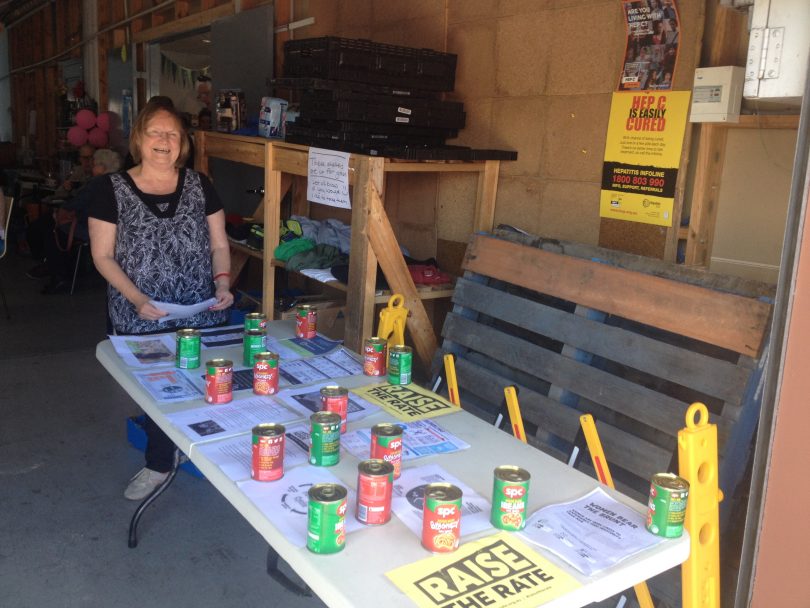 Barb Perry, of Tathra, volunteers with the Women's Resource Centre in Bega and was staffing the Raise the Rate stall at Sapphire Community Pantry today. Photo: Elka Wood.