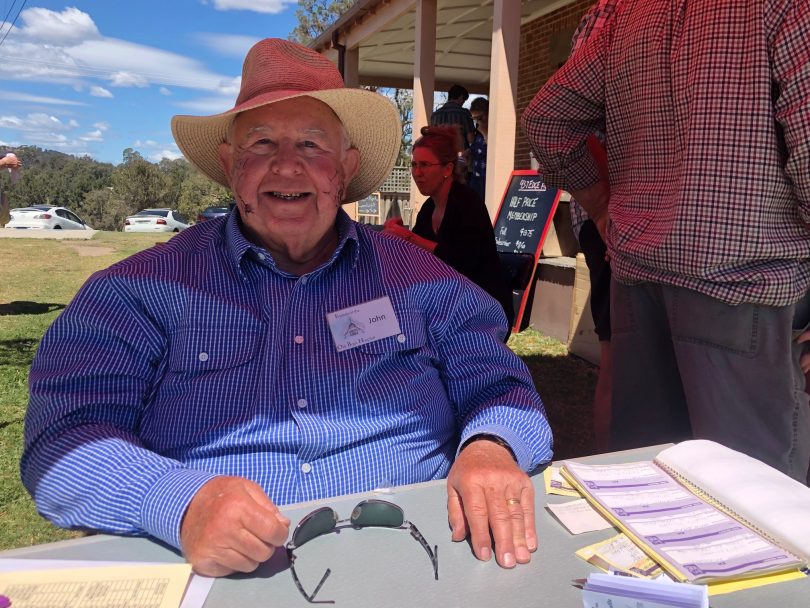 John Reynolds, from Friends of the Old Bega Hospital, selling raffle tickets at Raise the Roof. Photo: Ian Campbell.