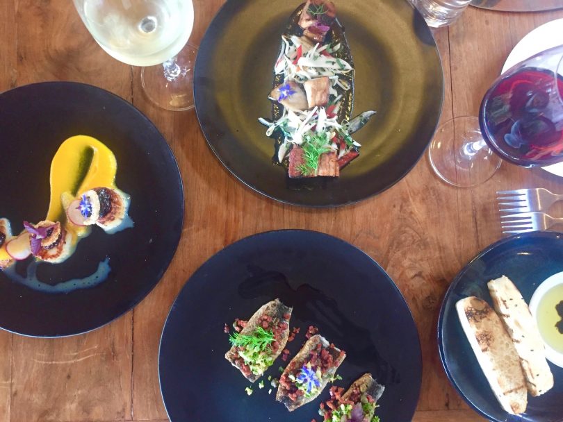 The Art of Lunch on the deck, sipping wine at Mimosa. Photo: Lisa Herbert